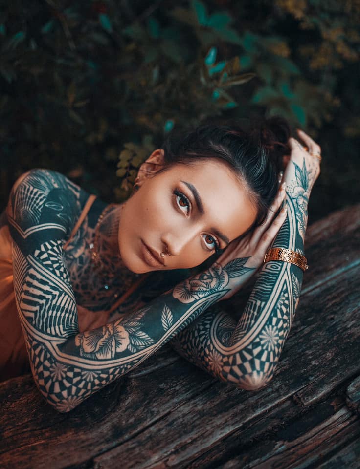 feminine arm tattoo